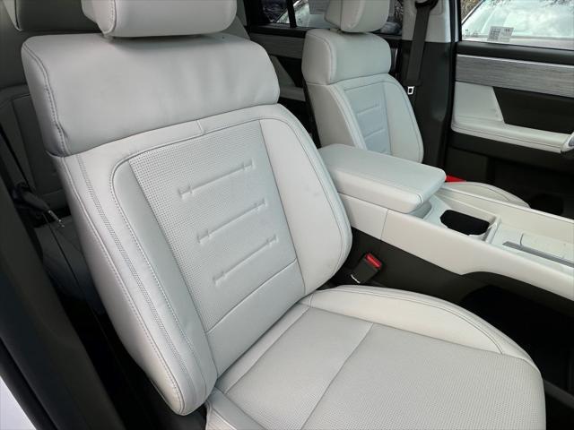 Photo of 2025 Serenity White Hyundai SANTA FE HEV