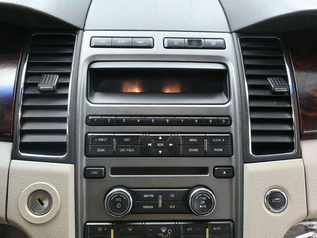 Photo of 2012 Red Candy Metallic Tinted Ford Taurus