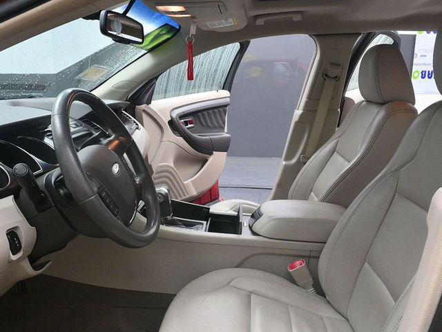 Photo of 2012 Red Candy Metallic Tinted Ford Taurus