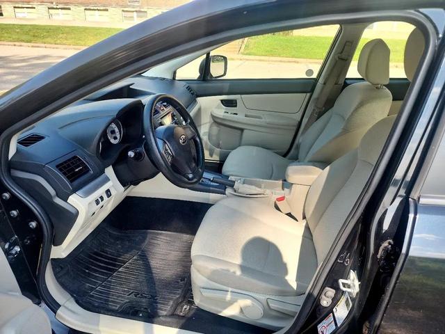Photo of 2014 Crystal Black Silica Subaru Impreza
