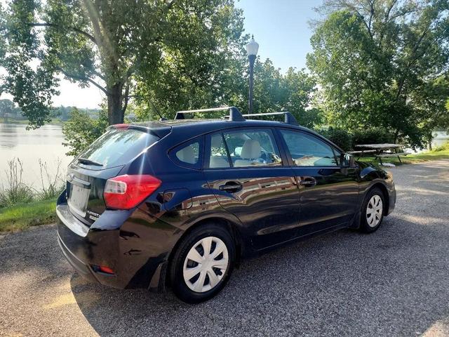 Photo of 2014 Crystal Black Silica Subaru Impreza
