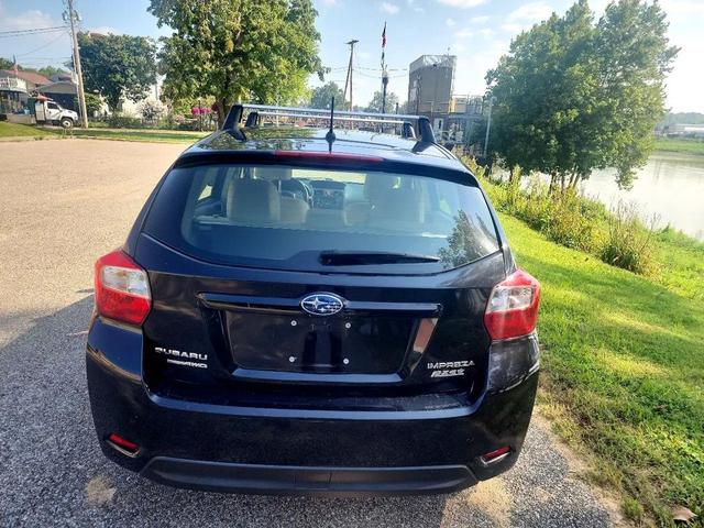 Photo of 2014 Crystal Black Silica Subaru Impreza
