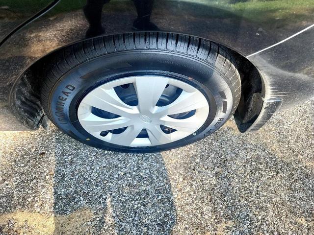 Photo of 2014 Crystal Black Silica Subaru Impreza
