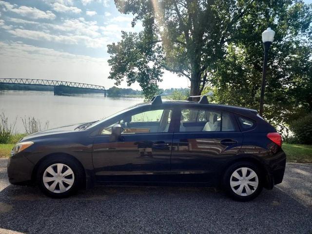 Photo of 2014 Crystal Black Silica Subaru Impreza