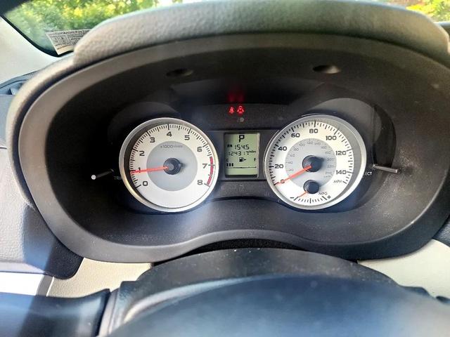 Photo of 2014 Crystal Black Silica Subaru Impreza