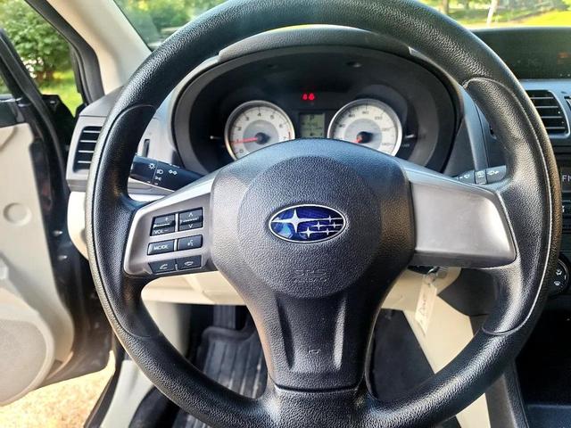 Photo of 2014 Crystal Black Silica Subaru Impreza