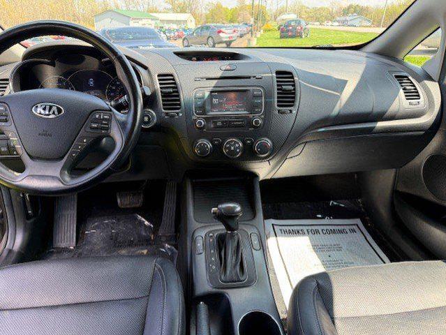 Photo of 2014 Metallic Bronze Kia Forte