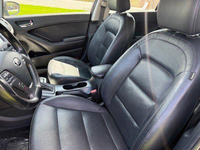 Photo of 2014 Metallic Bronze Kia Forte