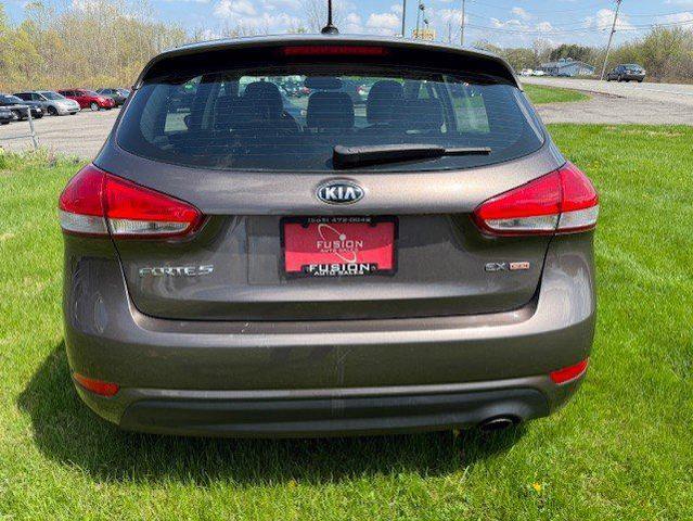 Photo of 2014 Metallic Bronze Kia Forte