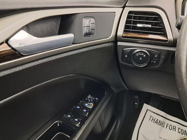 Photo of 2014 Ruby Red Metallic Tinted Clearcoat Ford Fusion Energi