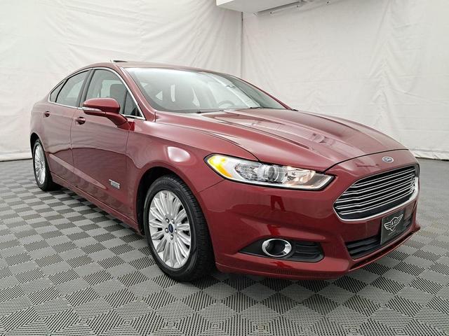 Photo of 2014 Ruby Red Metallic Tinted Clearcoat Ford Fusion Energi
