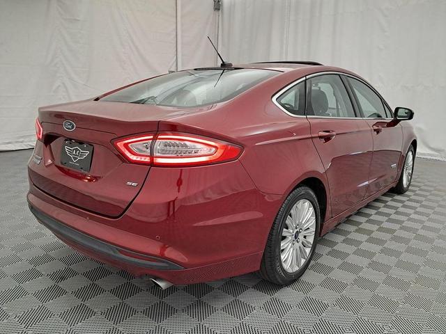 Photo of 2014 Ruby Red Metallic Tinted Clearcoat Ford Fusion Energi
