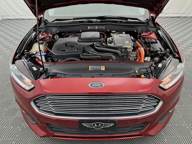 Photo of 2014 Ruby Red Metallic Tinted Clearcoat Ford Fusion Energi