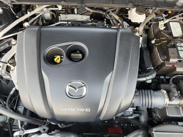 Photo of 2024 Jet Black Mica Mazda CX-50