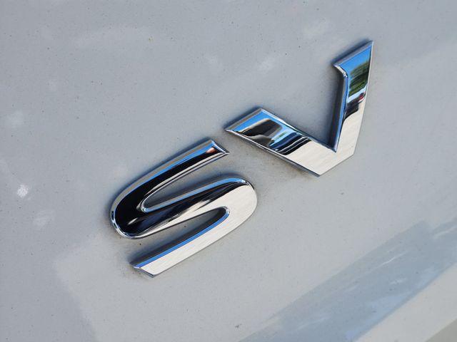 Photo of 2023 Pearl White Tricoat Nissan Rogue