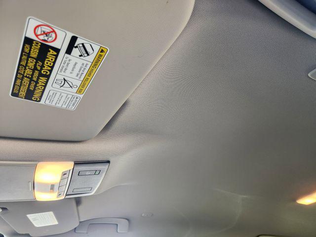 Photo of 2023 Pearl White Tricoat Nissan Rogue