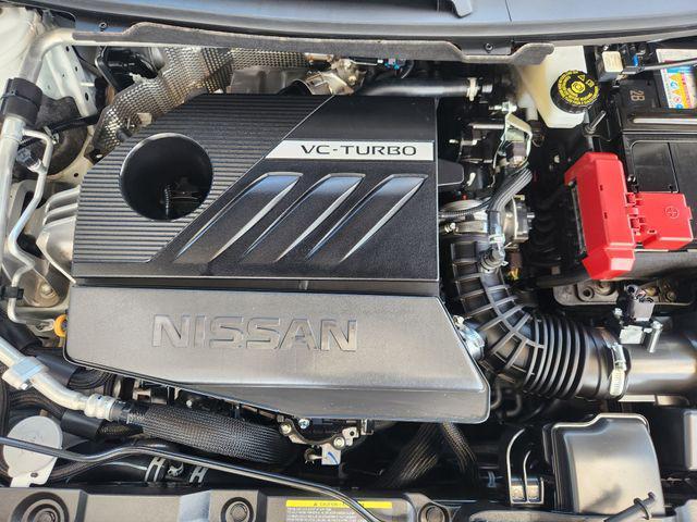 Photo of 2023 Pearl White Tricoat Nissan Rogue