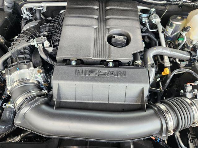 Photo of 2025 Glacier White Nissan Frontier