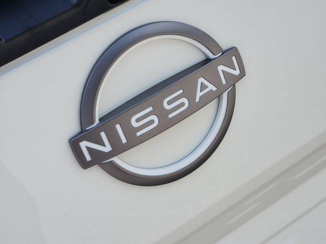 Photo of 2025 Glacier White Nissan Frontier
