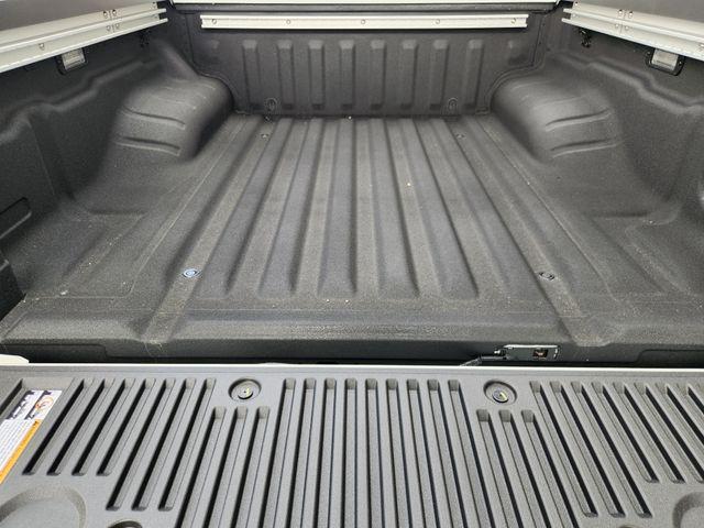 Photo of 2025 Glacier White Nissan Frontier