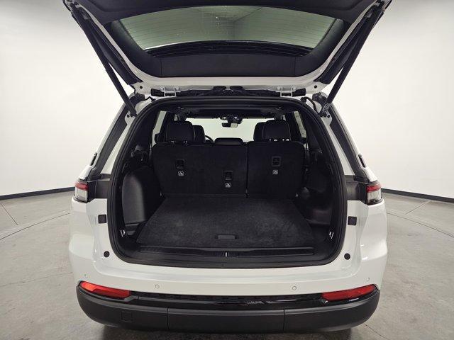 Photo of 2025 Bright White Clearcoat Jeep Grand Cherokee