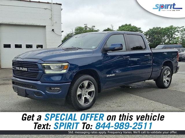 Photo of 2023 Patriot Blue Pearlcoat RAM 1500