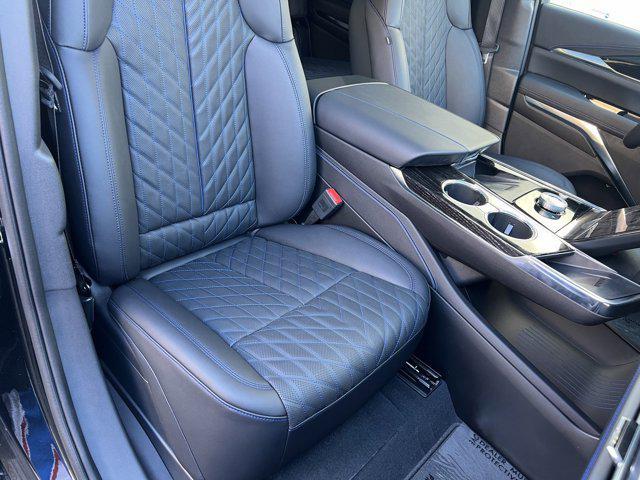 Photo of 2025 Black Raven Cadillac Escalade IQ