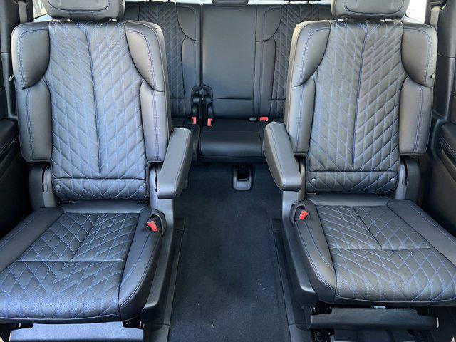 Photo of 2025 Black Raven Cadillac Escalade IQ