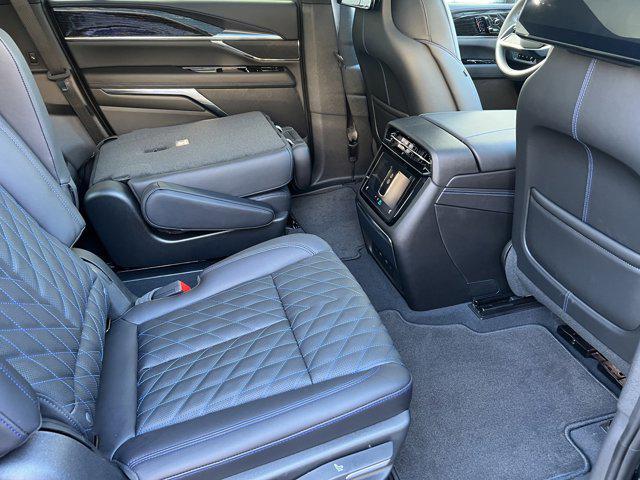 Photo of 2025 Black Raven Cadillac Escalade IQ