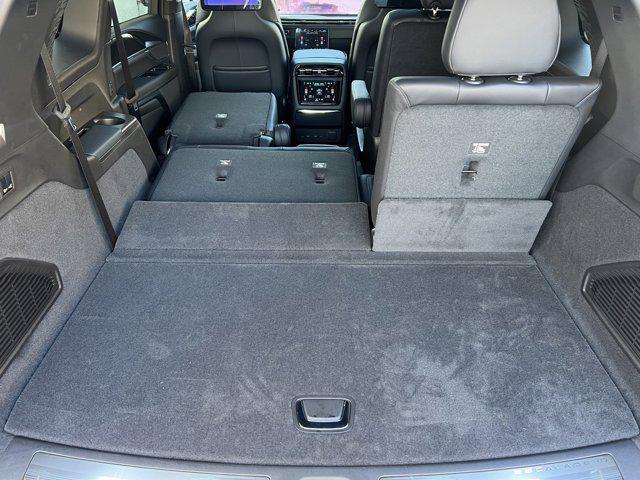 Photo of 2025 Black Raven Cadillac Escalade IQ