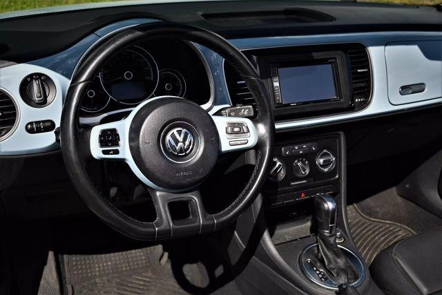 Photo of 2016 Blue Volkswagen Beetle