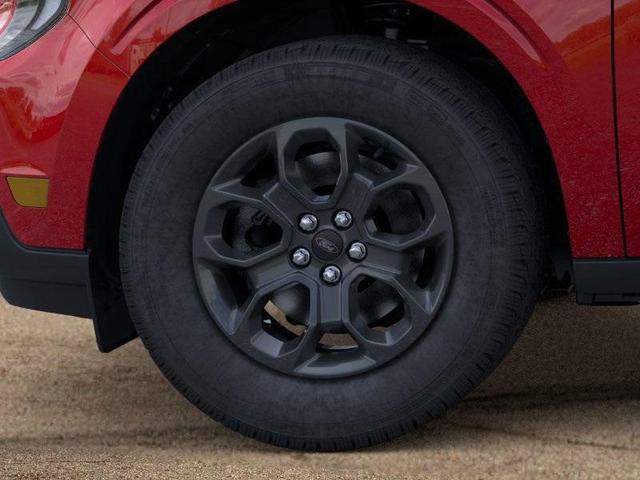 Photo of 2025 Ruby Red Metallic Tinted Clearcoat Ford Maverick