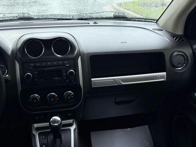 Photo of 2016 Deep Cherry Red Crystal Pearlcoat Jeep Compass