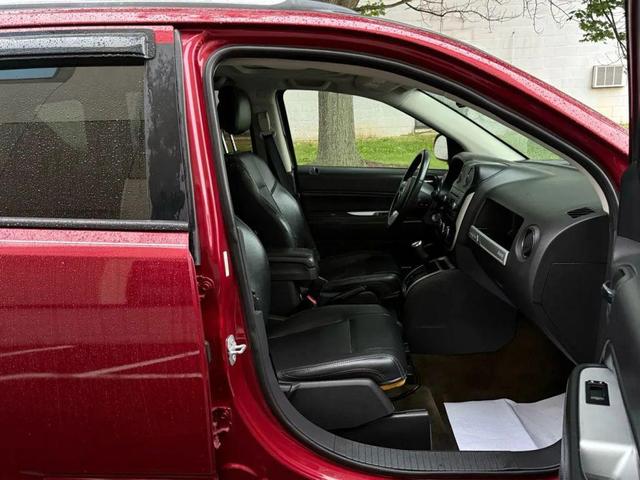 Photo of 2016 Deep Cherry Red Crystal Pearlcoat Jeep Compass