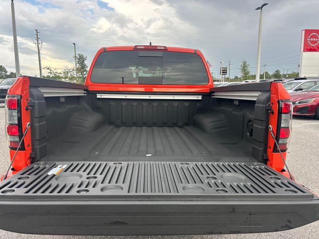 Photo of 2025 Orange Nissan Frontier
