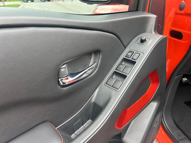 Photo of 2025 Orange Nissan Frontier