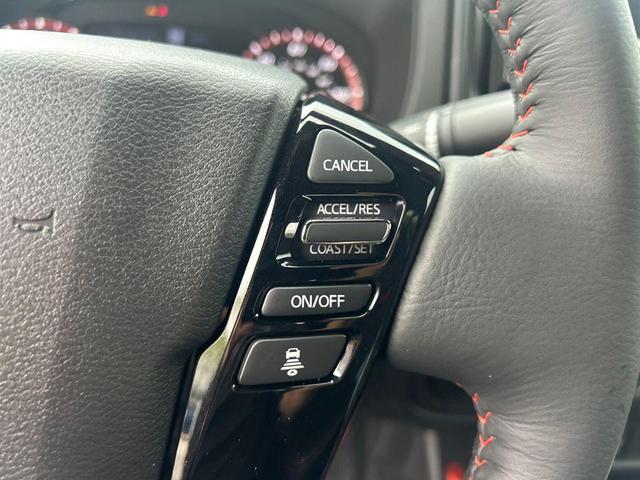 Photo of 2025 Orange Nissan Frontier