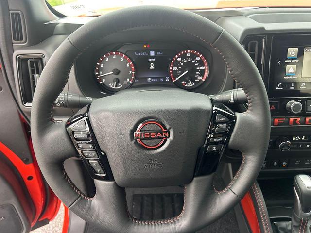 Photo of 2025 Orange Nissan Frontier
