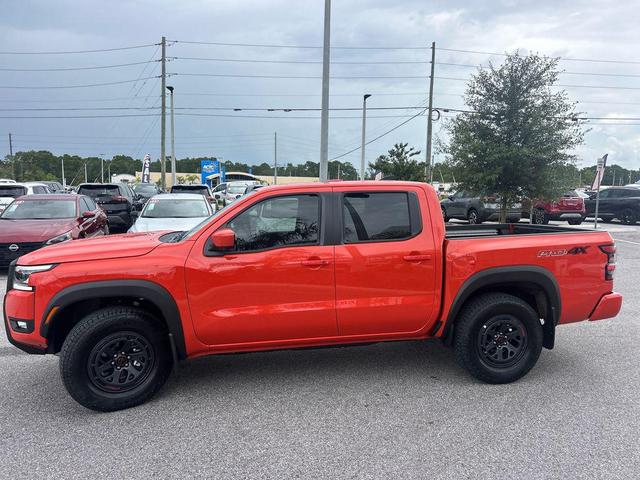 Photo of 2025 Orange Nissan Frontier