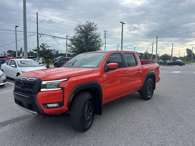 Photo of 2025 Orange Nissan Frontier