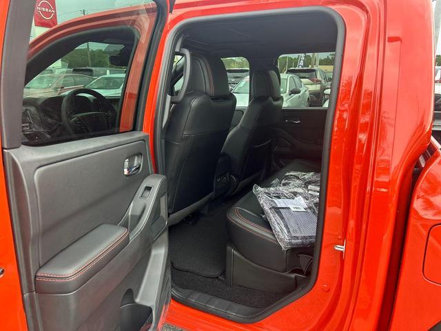 Photo of 2025 Orange Nissan Frontier
