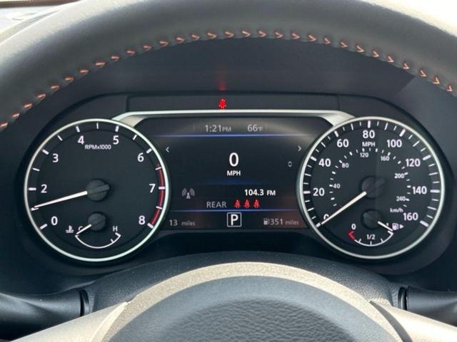 Photo of 2025 Aspen White Tricoat/Super Black Nissan Sentra