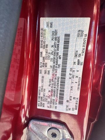 Photo of 2014 Ruby Red Tinted Clearcoat Ford Escape