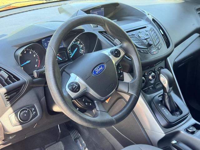 Photo of 2014 Ruby Red Tinted Clearcoat Ford Escape