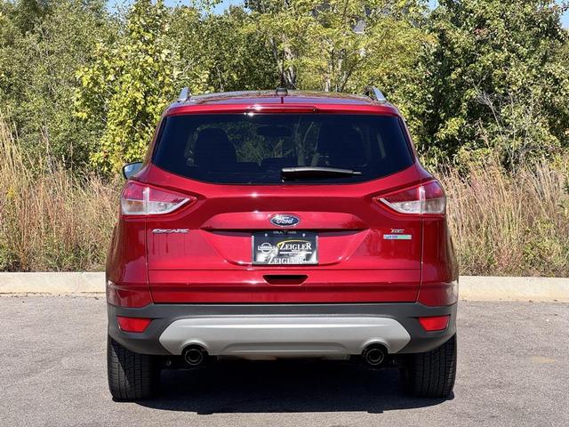 Photo of 2014 Ruby Red Tinted Clearcoat Ford Escape