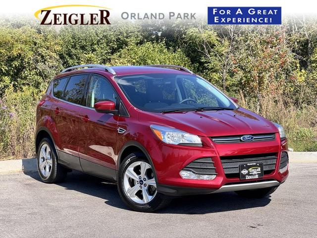 Photo of 2014 Ruby Red Tinted Clearcoat Ford Escape
