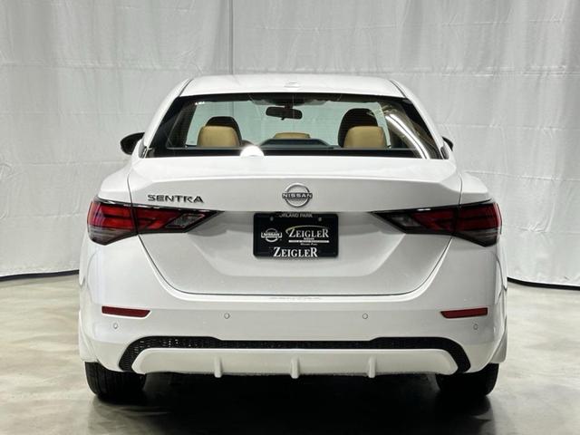 Photo of 2025 Aspen White Tricoat Nissan Sentra