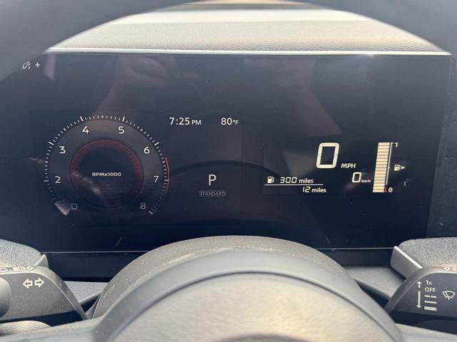 Photo of 2025 Aspen White Tricoat Nissan Kicks