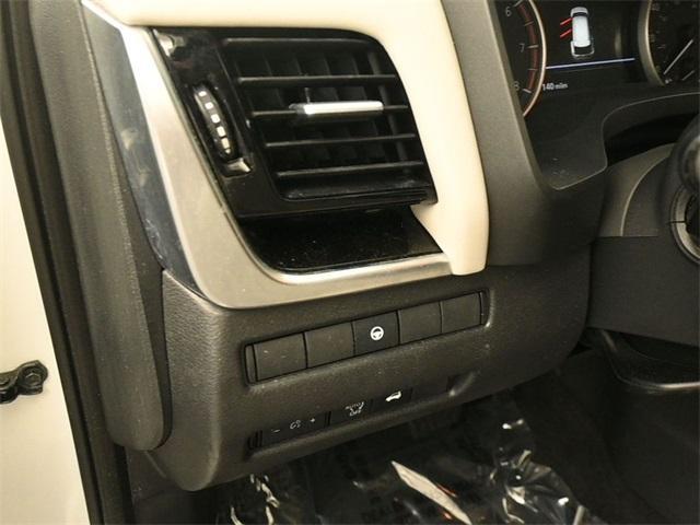 Photo of 2023 Pearl White Tri-Coat Nissan Rogue
