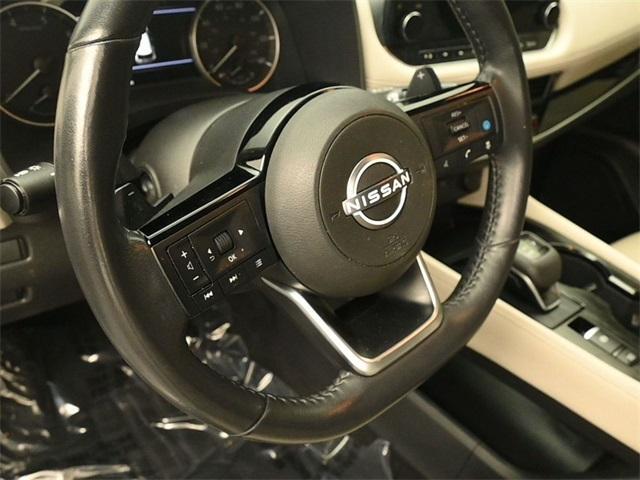 Photo of 2023 Pearl White Tri-Coat Nissan Rogue